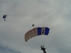 secondary military crossover. usaf parachutists bringing in the game ball.