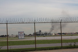 black smoke over the field at mdw, after seeing two fighter jets take off