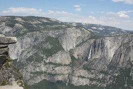 overhanging rock and yosemite falls from glacier point