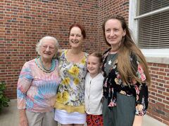 four generations of ladies outside